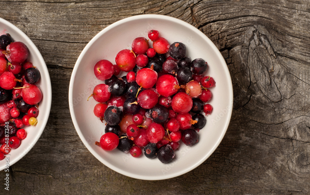 Summer berries and ice in white bowl Summer berries and ice in white bowl