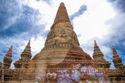 Buddhist Temple In Myanmar With An Image of A Statue of The Buddha Superimposed On it