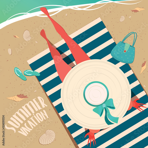 Top view of a girl in wide-brimmed hat sitting on a striped beach mat by the sea - Summer vacation concept