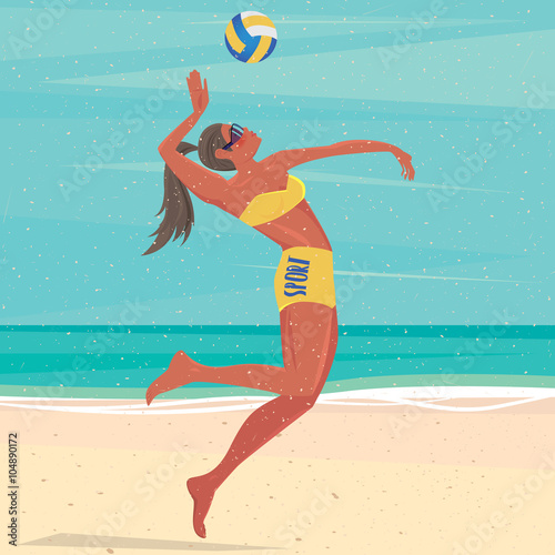 Volleyball player on a beach jumping hits the ball - Fitness or training concept