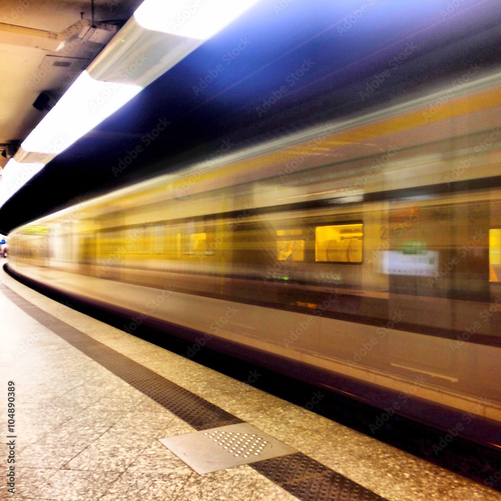 train passing by in railway station