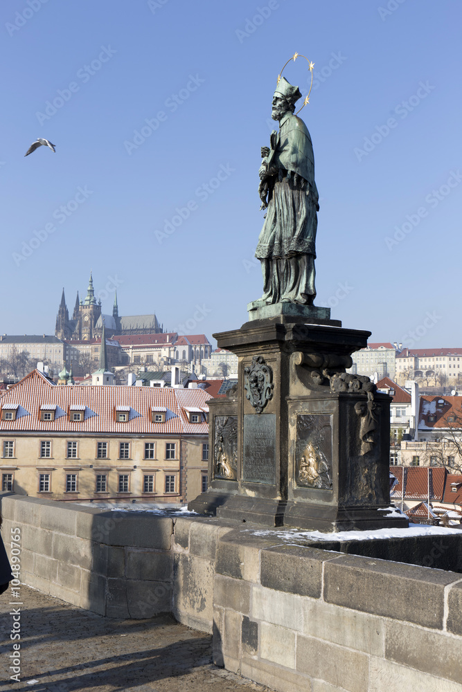 St. John of Nepomuk's Statue on Charles Bridge and Prague Castle, Czech republic
