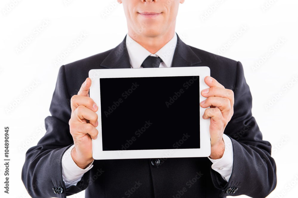 Close up of serious businessman demonstrating black screen of ta