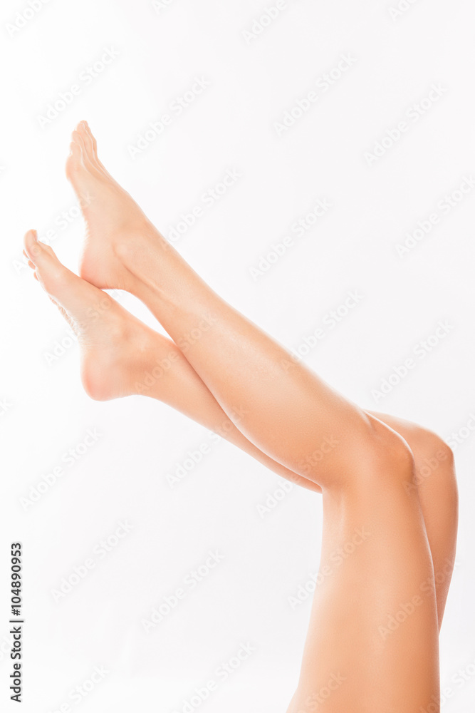 Close up photo of smooth woman's legs with perfect skin Close up photo of smooth woman's legs with perfect skin
