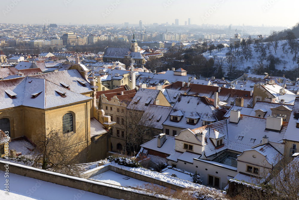 Fototapeta premium Romantic snowy Prague City in the sunny Day, Czech Republic