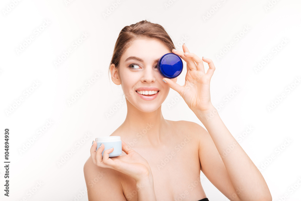 Woman holding moisturizing facial cream Woman holding moisturizing facial cream