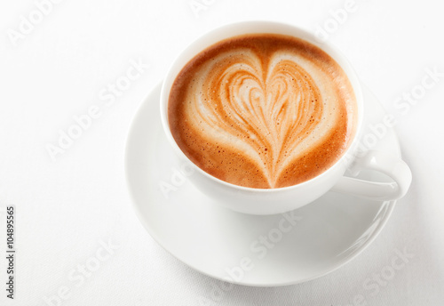 Decorative cup of cappuccino coffee