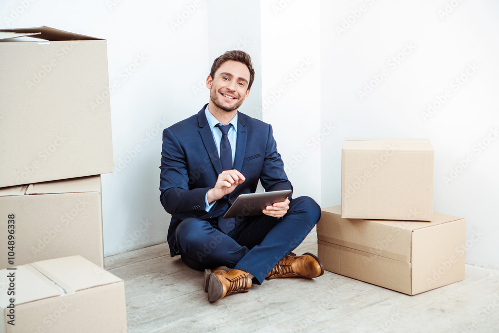 Businessman moving to new home Businessman moving to new home