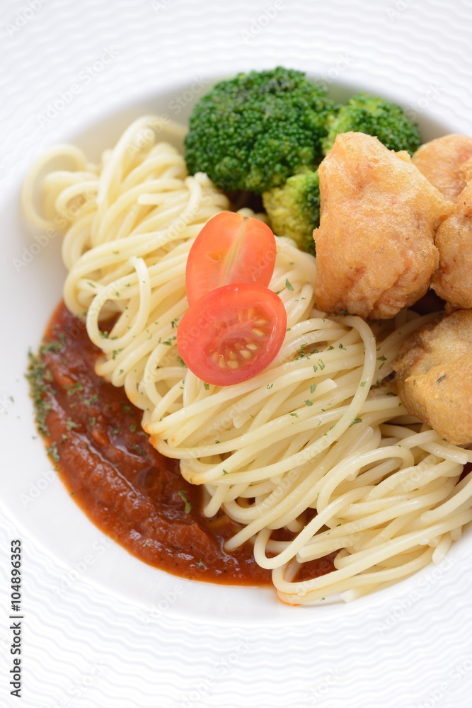 Spaghetti with chicken nuggets 