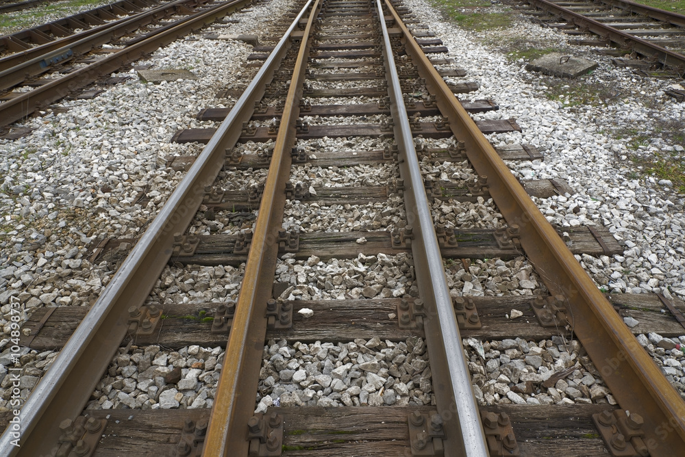 multiple railroad tracks going off in the distance