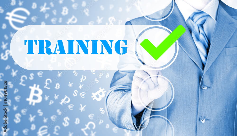 Businessman pressing touch screen interface training checkbox Businessman pressing touch screen interface training checkbox