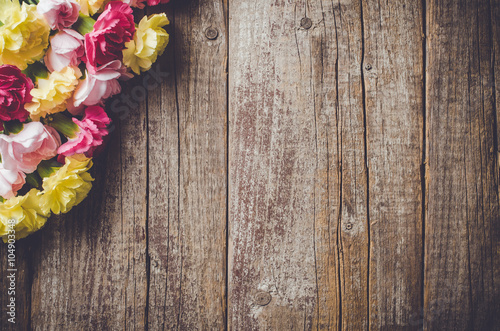 Fototapeta Naklejka Na Ścianę i Meble -  Carnation flowers on wooden table