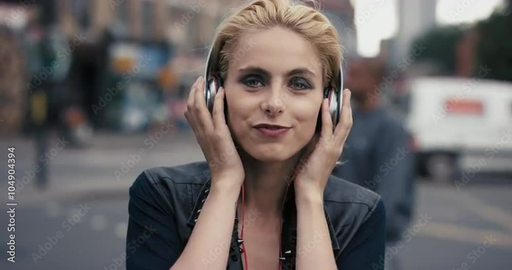 Slow Motion Portrait of happy beautiful caucasian punk woman listening to music Slow Motion Portrait of happy beautiful caucasian punk woman listening to music