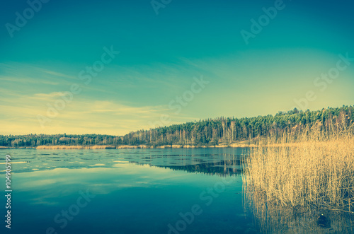 Vintage landscape of lake.
