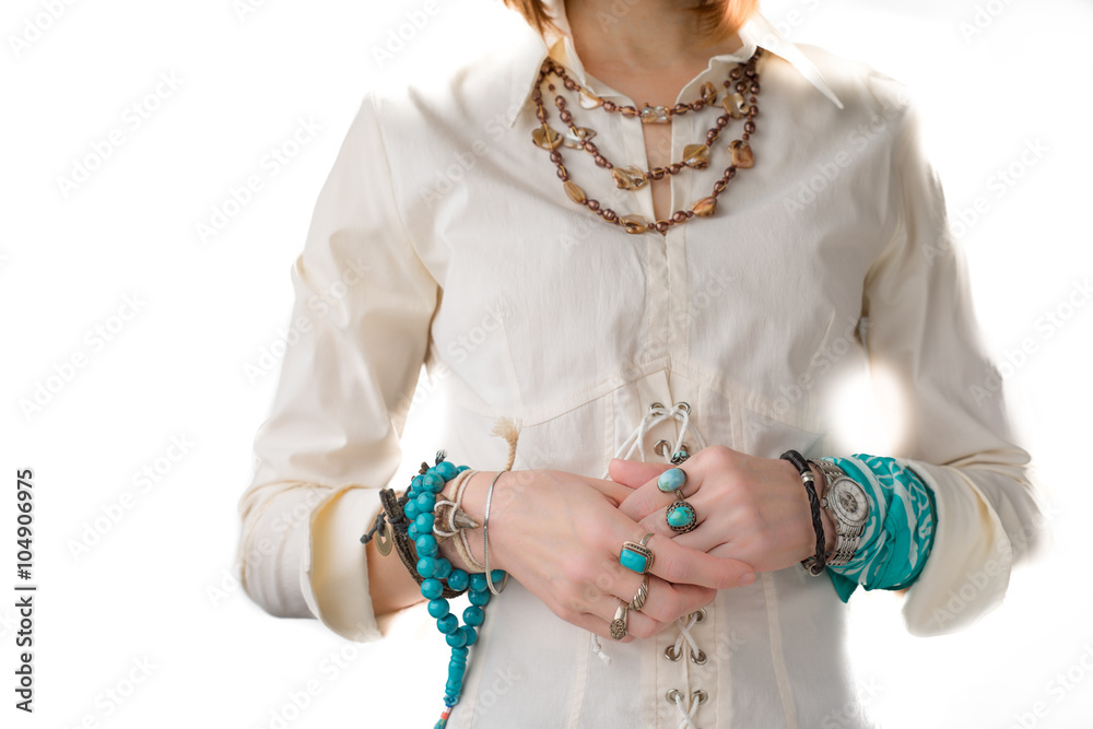 Woman in jewelry turquoise and pearl