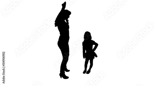 Silhouette of girls who dances.