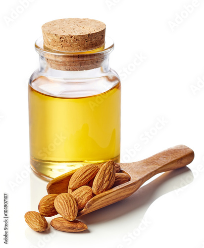 Almond oil and almonds photo