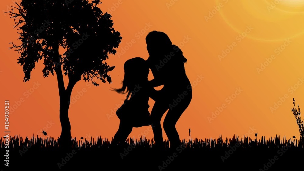 Silhouette family in a park at sunset. Silhouette family in a park at sunset.
