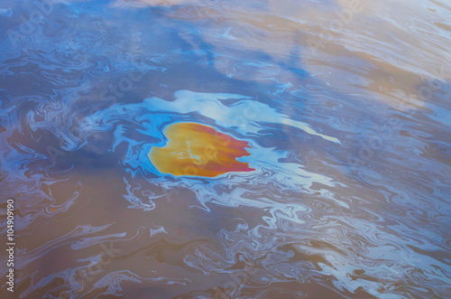 an oil slick on the water surface