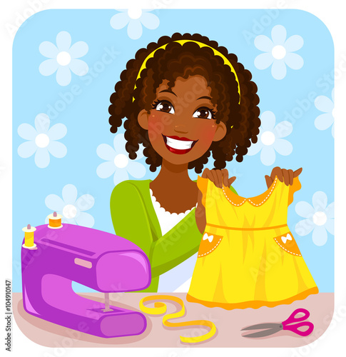 young woman sewing a dress for a little girl