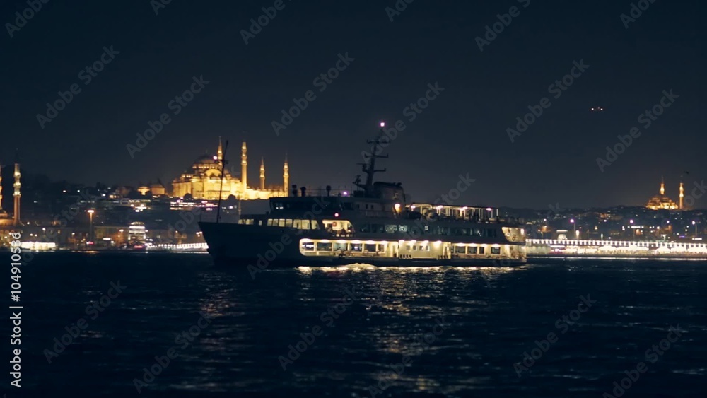World Famous Bosphorus Ferry and The Mosques at night in Istanbul Turkey World Famous Bosphorus Ferry and The Mosques at night in Istanbul Turkey