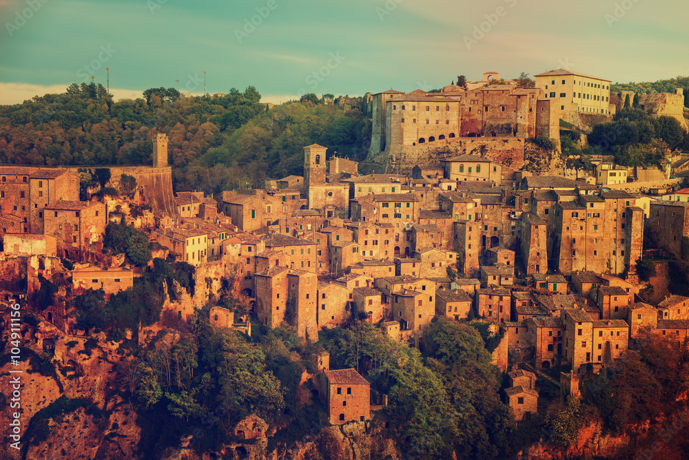 Sorano - tuff city in Tuscany. Italy. View in the dusk, travel background