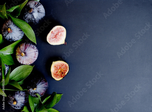 figs with leaves on a black, selective focus