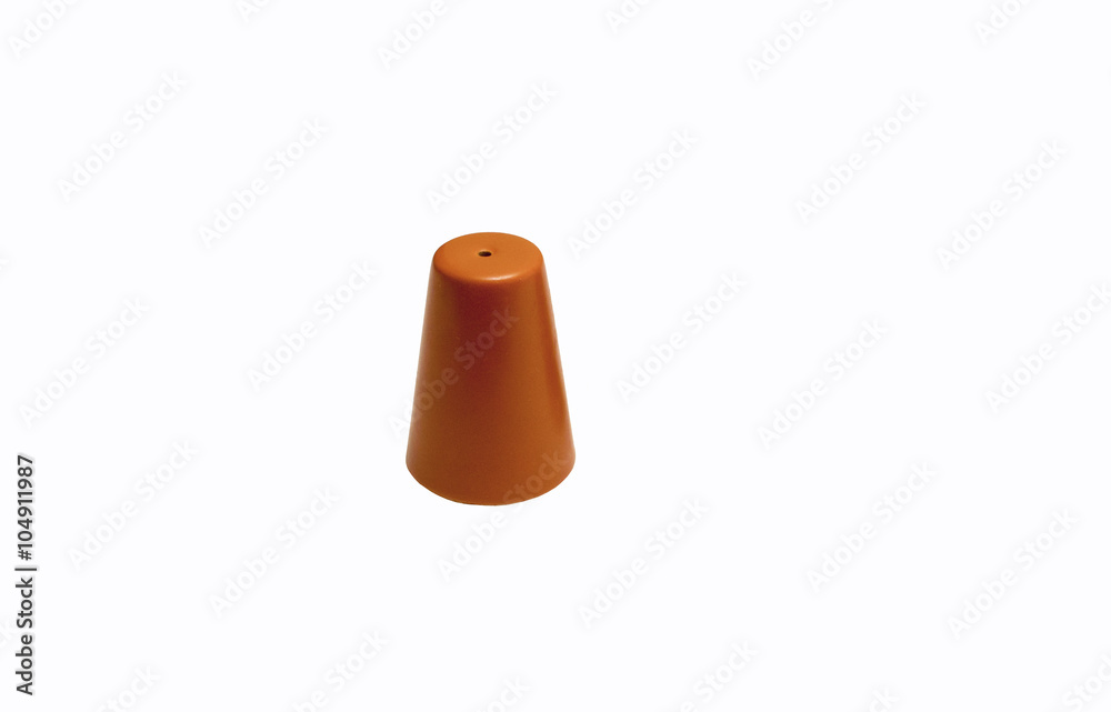 Salt and pepper shakers / the composition consists a salt and pepper shakers isolated on white background Salt and pepper shakers / the composition consists a salt and pepper shakers isolated on white background