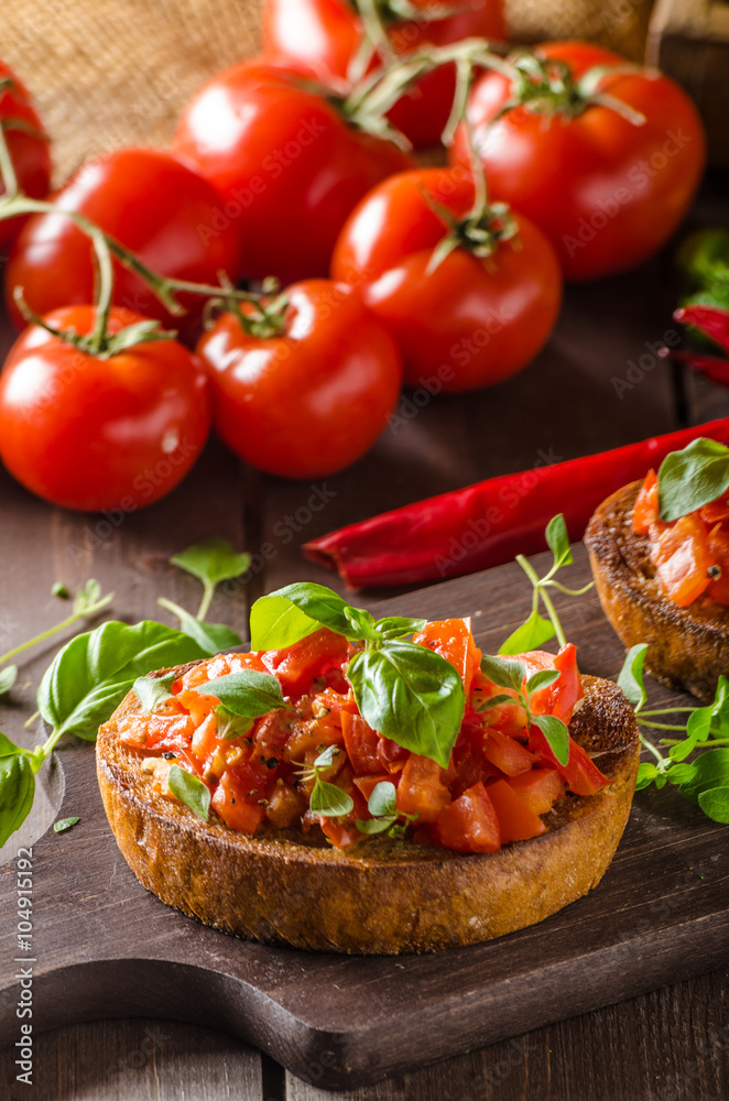 Italian bruschetta with roasted tomatoes and garlic Italian bruschetta with roasted tomatoes and garlic