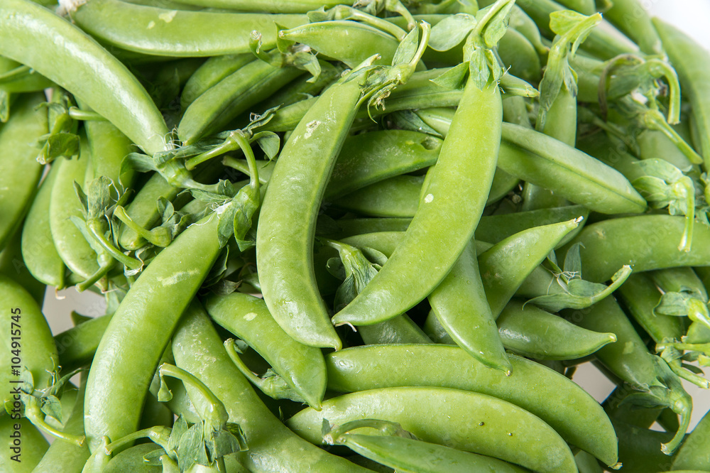 Sugar snap peas in isolated white background Sugar snap peas in isolated white background