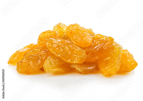 Yellow raisins close-up isolated on a white background.