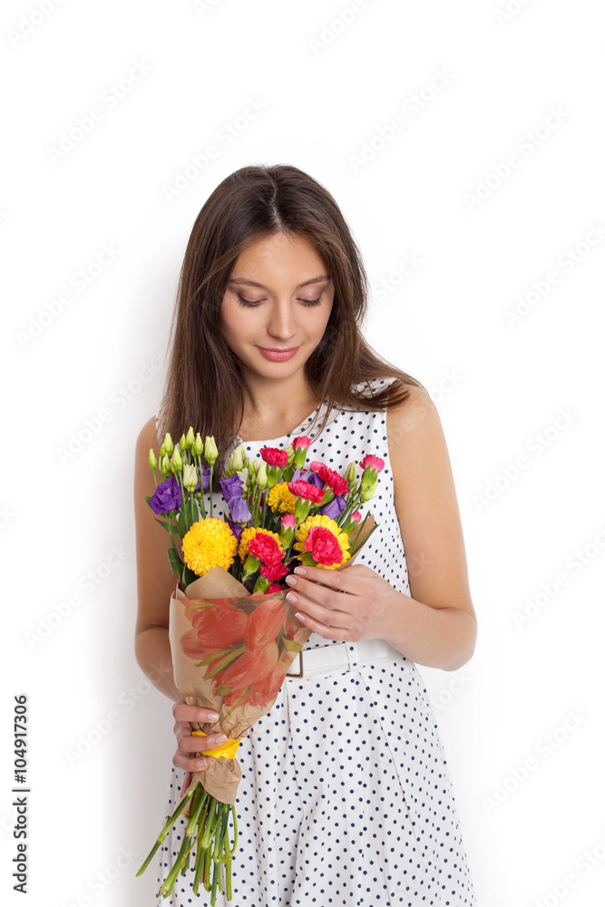 Happy surprised model woman smelling flowers Happy surprised model woman smelling flowers