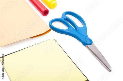Closeup of scissors on blank desk with office tools
