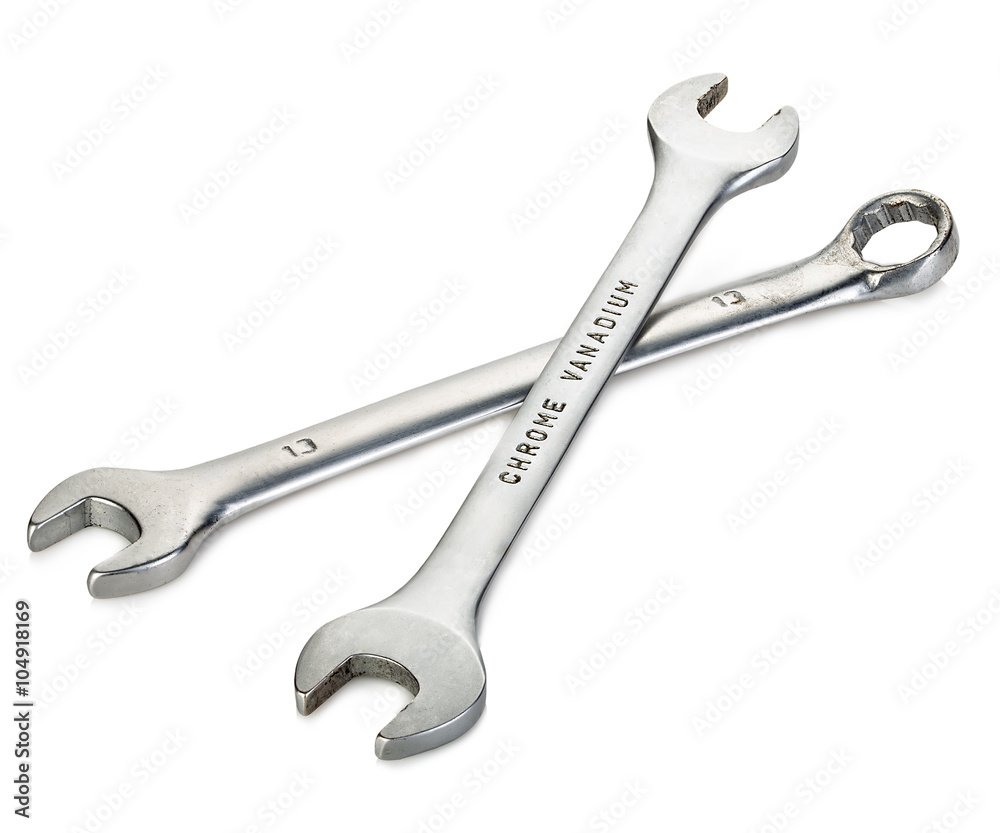 Two metal wrenches close-up isolated on a white background. Two metal wrenches close-up isolated on a white background.
