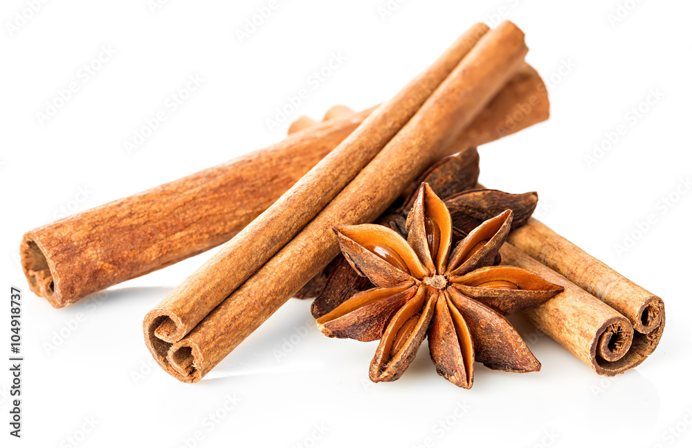 Cinnamon stick and star anise spice close-up isolated on white background. Cinnamon stick and star anise spice close-up isolated on white background.