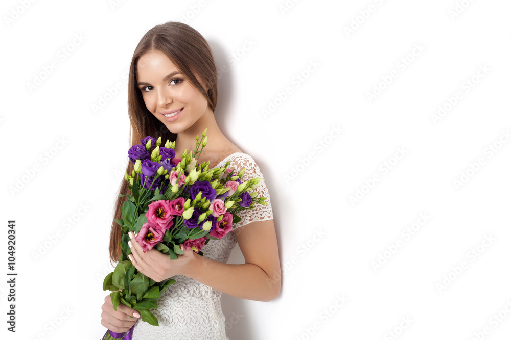 Young cute woman holding Bouquet of flowers