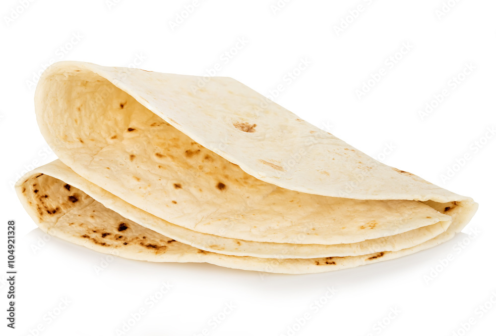 Wheat round tortillas close-up isolated on a white background. Lavash. Wheat round tortillas close-up isolated on a white background. Lavash.