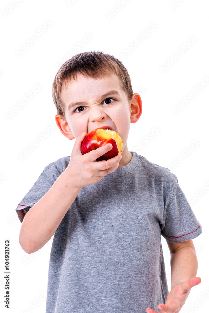 little boy with food isolated on white background - apple or a m little boy with food isolated on white background - apple or a m