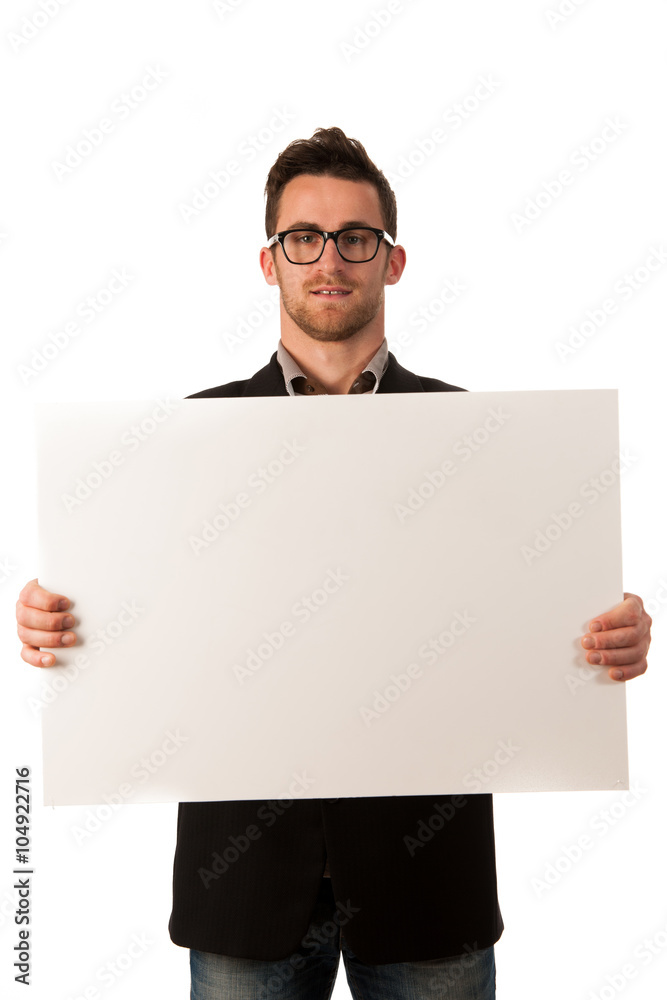Confident business couple standing next to a big blank board to Confident business couple standing next to a big blank board to