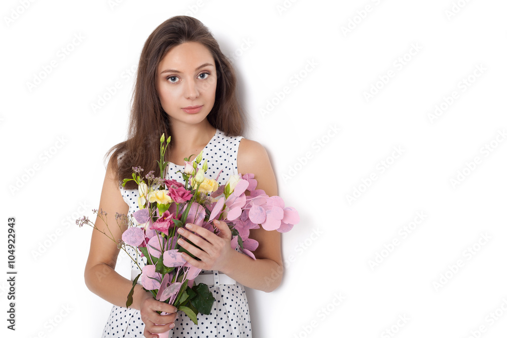 Pretty beautiful girl holding bunch of flowers Pretty beautiful girl holding bunch of flowers
