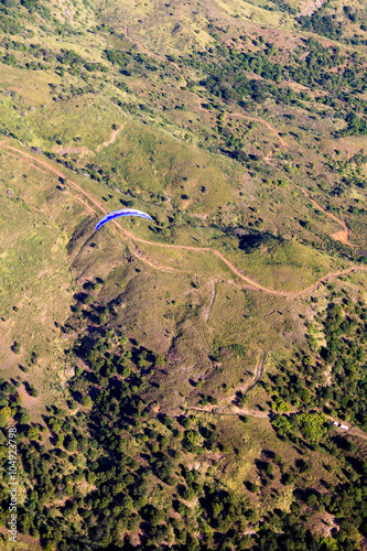 Paisagem aérea em Governador Valadares com Paraglider e pico do ibituruna e vale do rio Doce photo