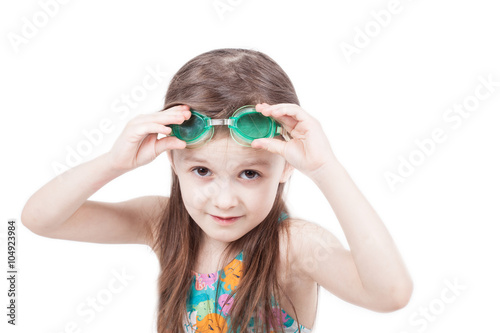 Portrait of child girl swimer isolated on white background