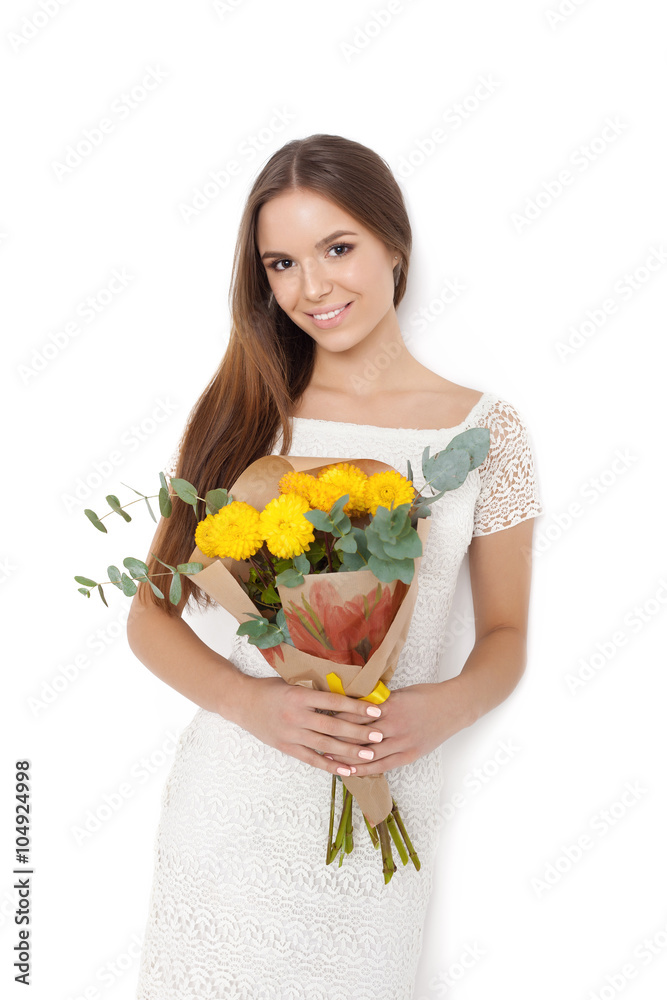 Young cute woman holding Bouquet of flowers