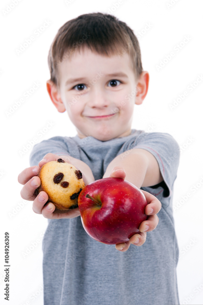 little boy with food isolated on white background - apple or a m little boy with food isolated on white background - apple or a m