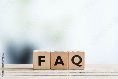 FAQ sign on an office table