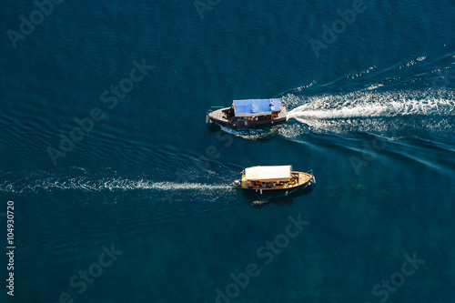View from the top down by two passenger ship passing by
