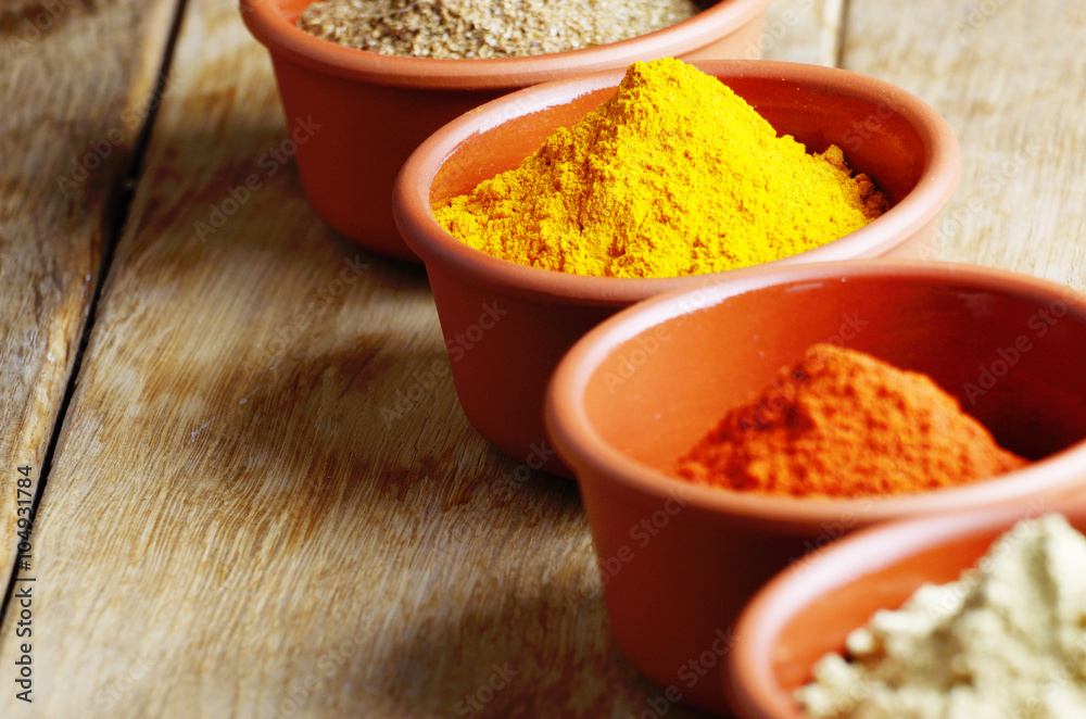 Paprika, mustard, coriander and turmeric spices Paprika, mustard, coriander and turmeric spices