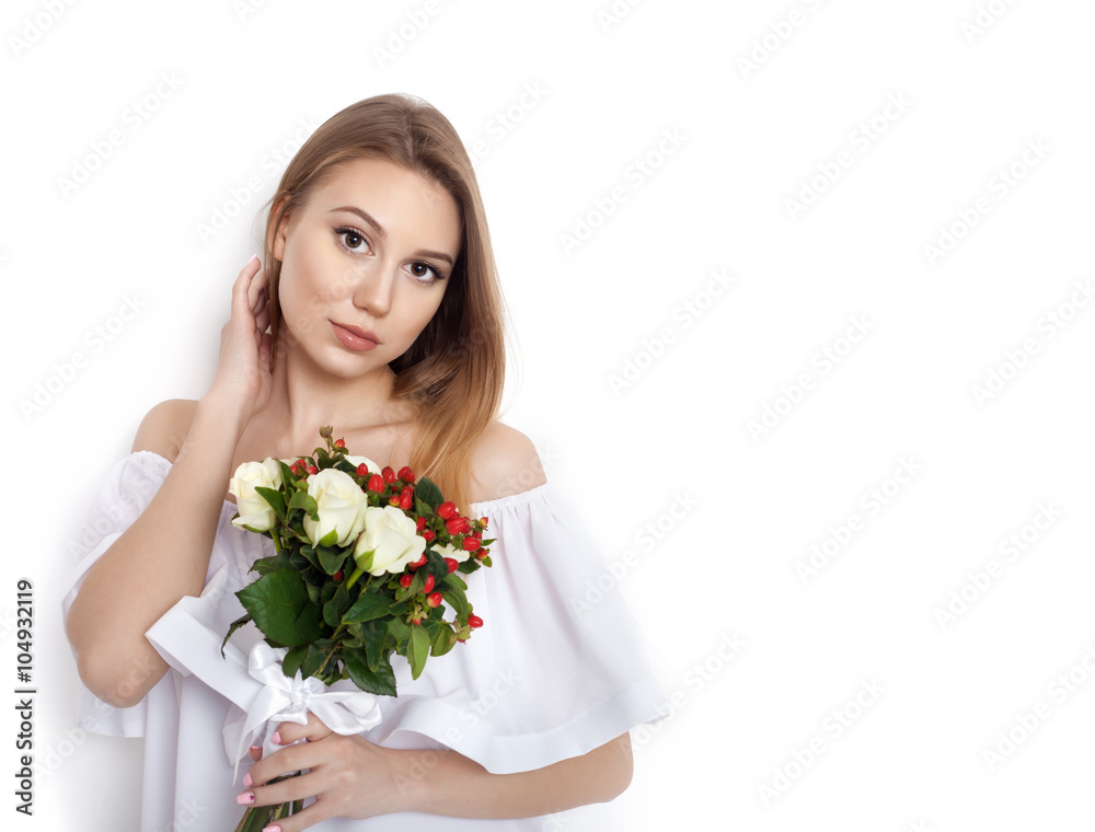 Pretty beautiful girl holding bunch of flowers