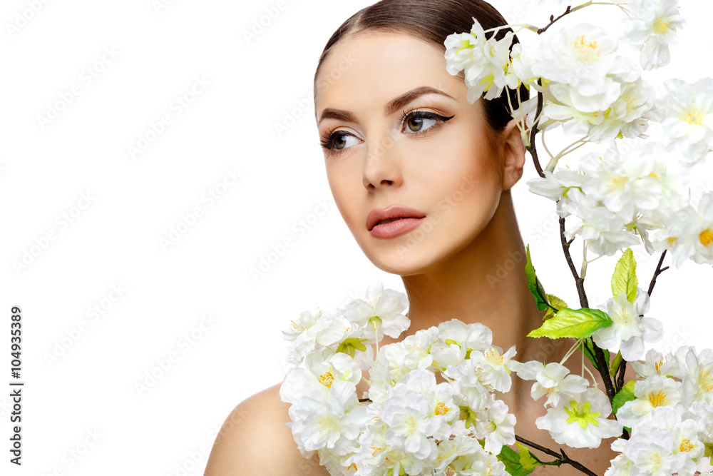 Beautiful Woman with Clean Fresh Skin holding flowering branches Beautiful Woman with Clean Fresh Skin holding flowering branches