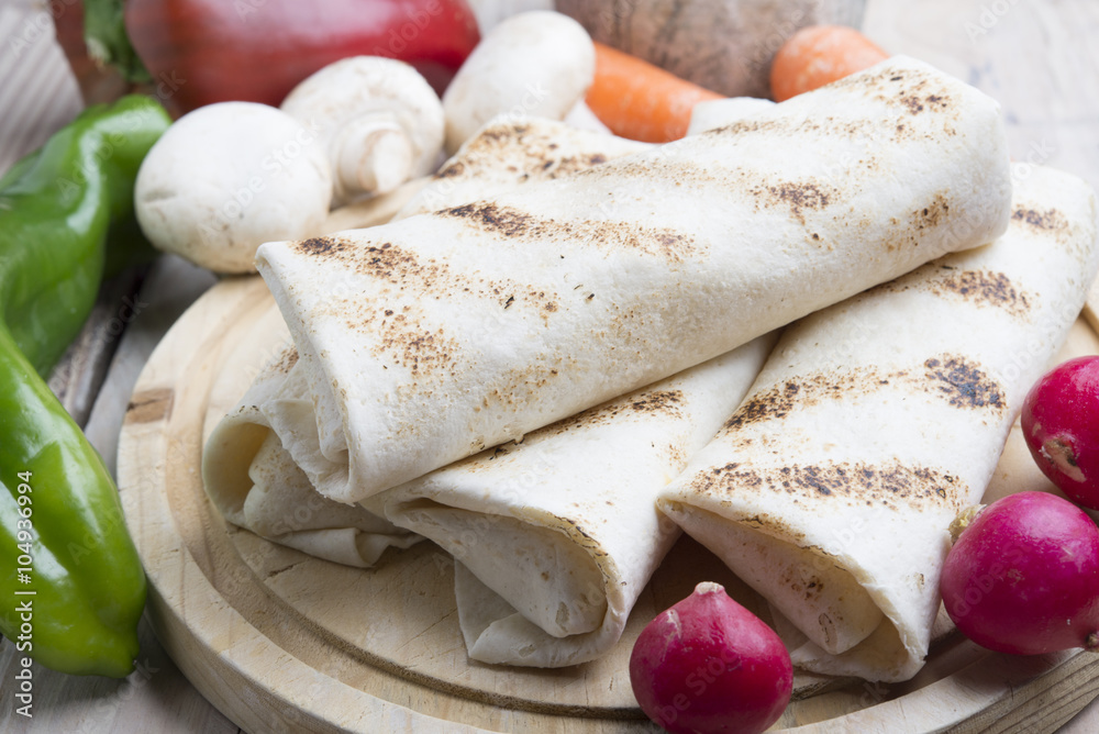 tortilla wraps with meat and vegetables